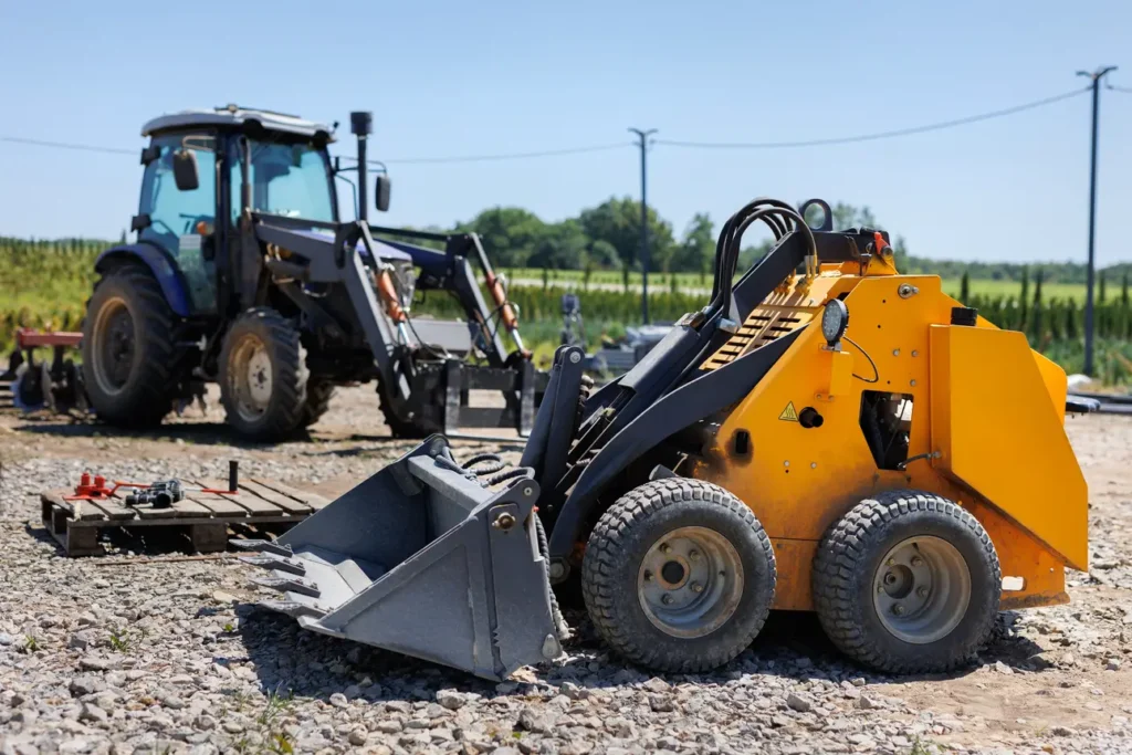 Skid Steer vs Backhoe Loader: